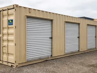 40ft New Storage Container w/ (4) 7ft Roll-Up Doors