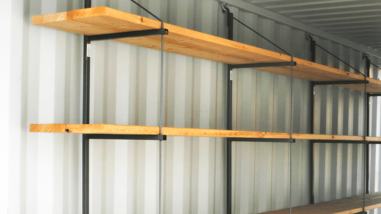Removable shelving system for shipping container