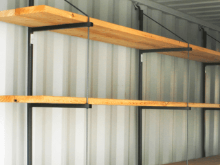 Removable shelving system for shipping container