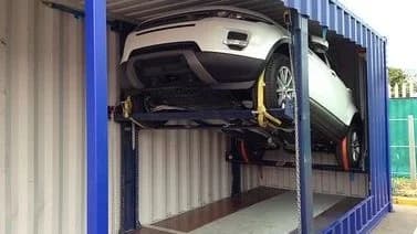 Shipping container car rack