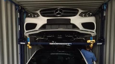 Shipping container car rack