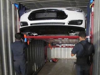 Shipping container car rack