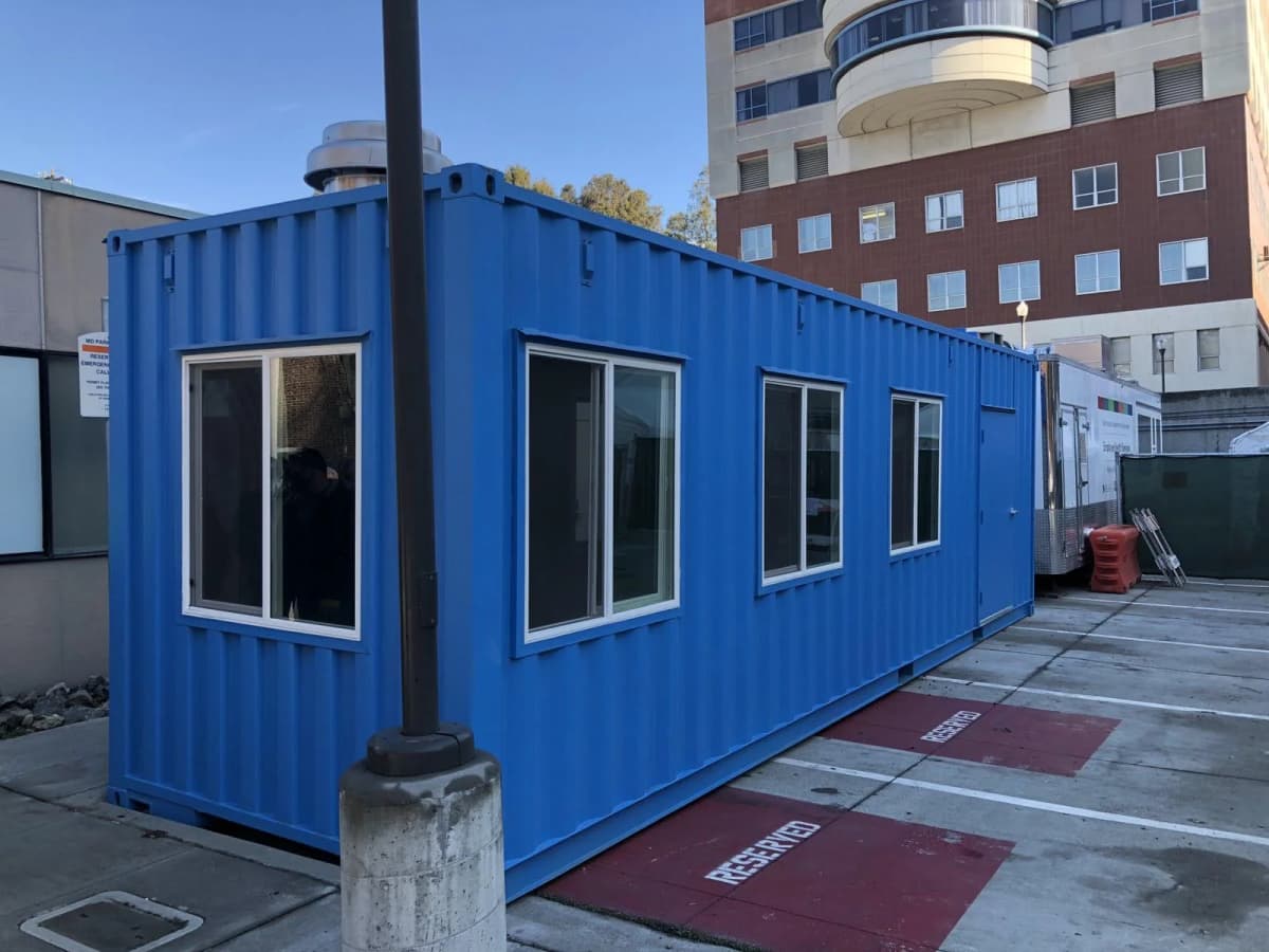 Double pane sliding windows installed on a shipping container