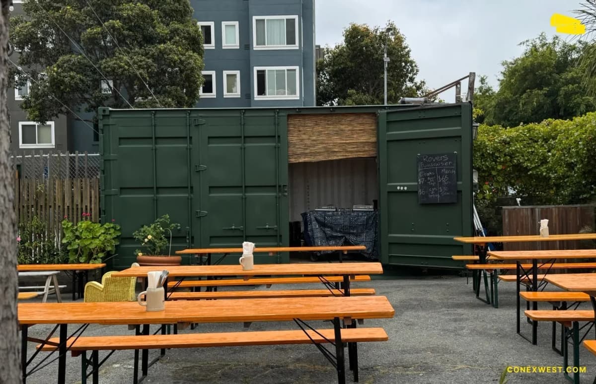 Conex Mike ordering a beer at the container-built walk-up bar at Biergarten