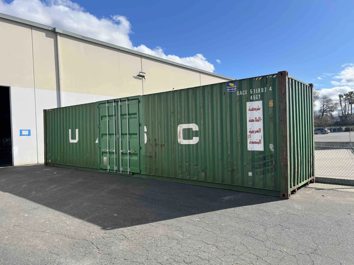 A green container with dual cargo doors