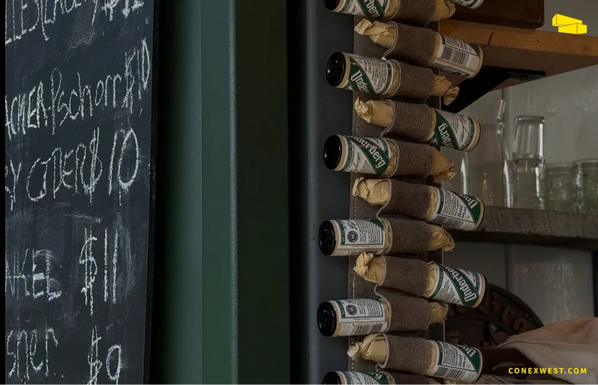 Close-up of beer and menu items served from the container bar at Biergarten