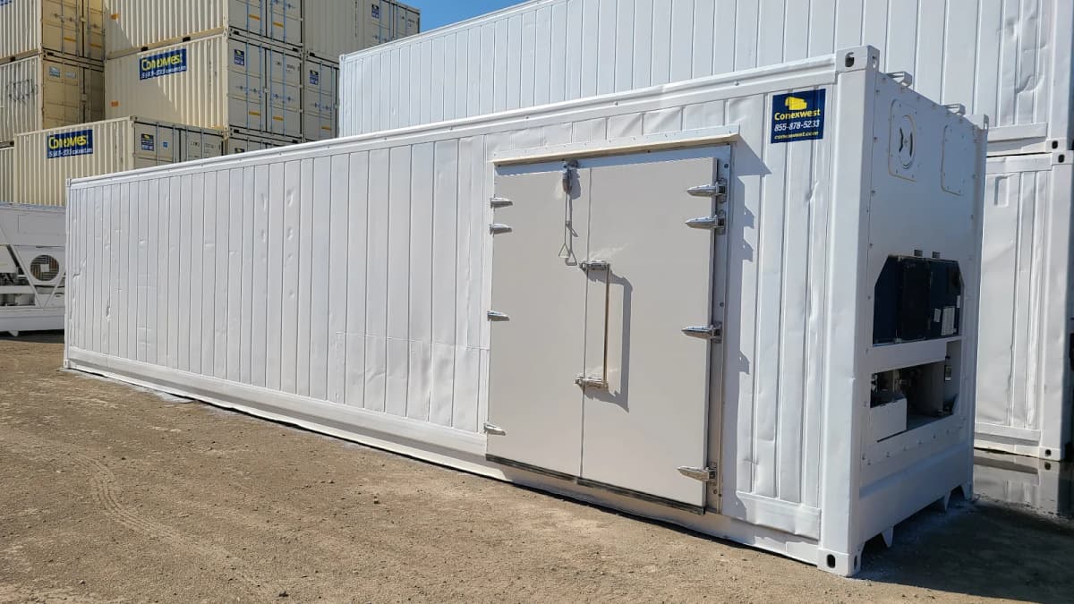 A white reefer container with cold storage butcher doors