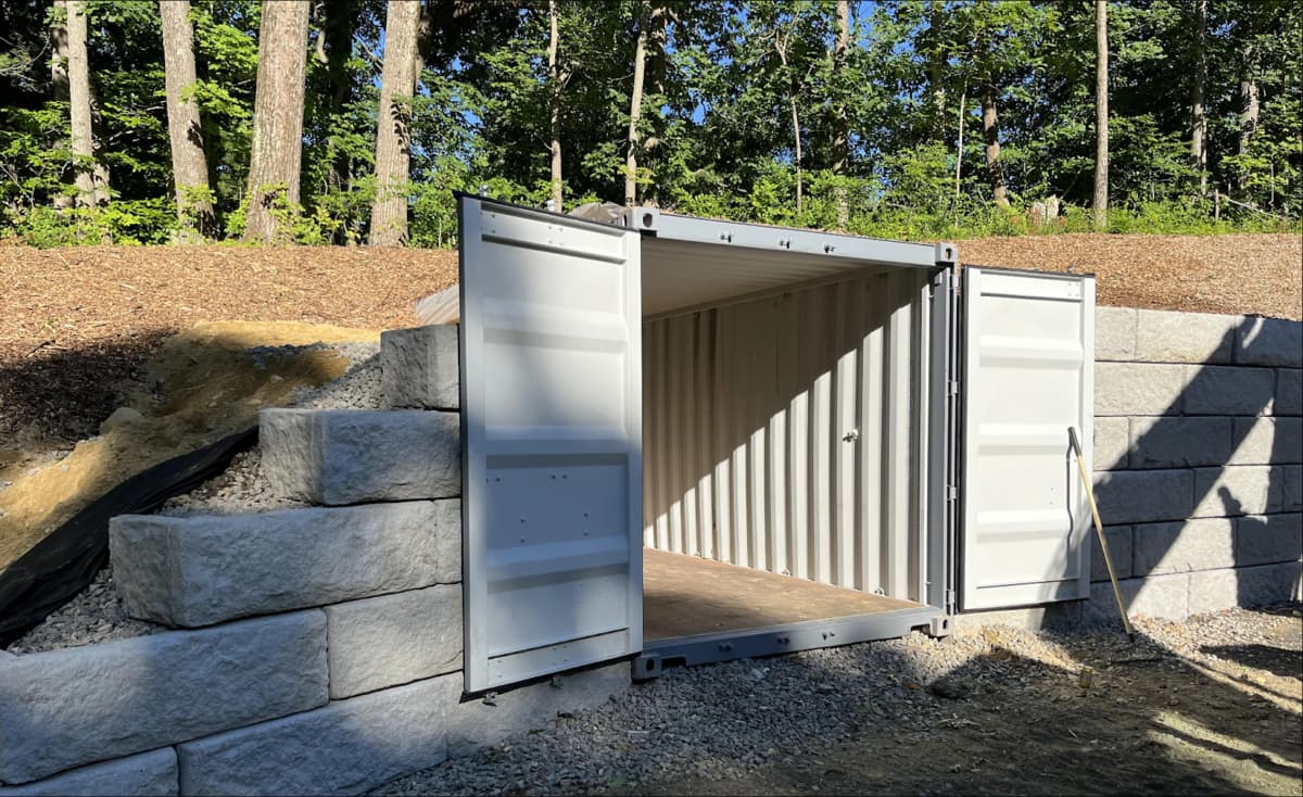 Shipping container bunker concept with reinforced container structure