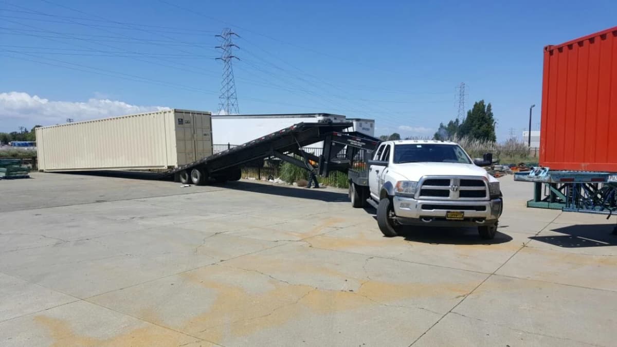 Placing shipping and storage container  on the ground by Conexwest