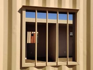 Window security bars for storage containers for sale
