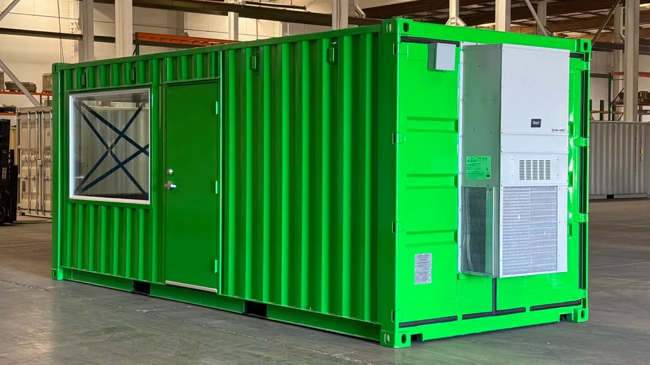 Bright green container in a factory