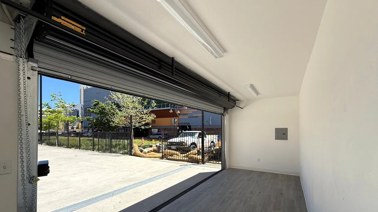 Container interior with large roll up door