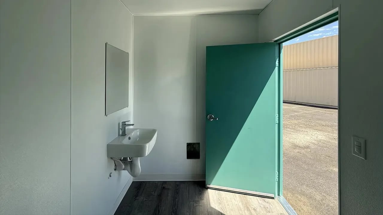 Restroom container