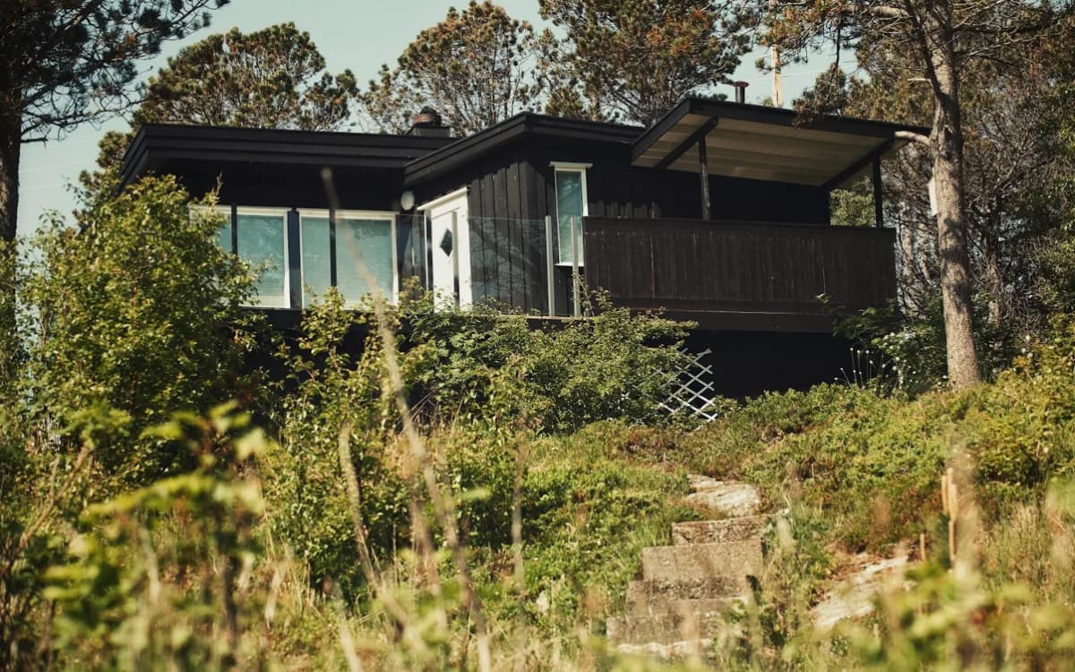 A container home in the woods.
