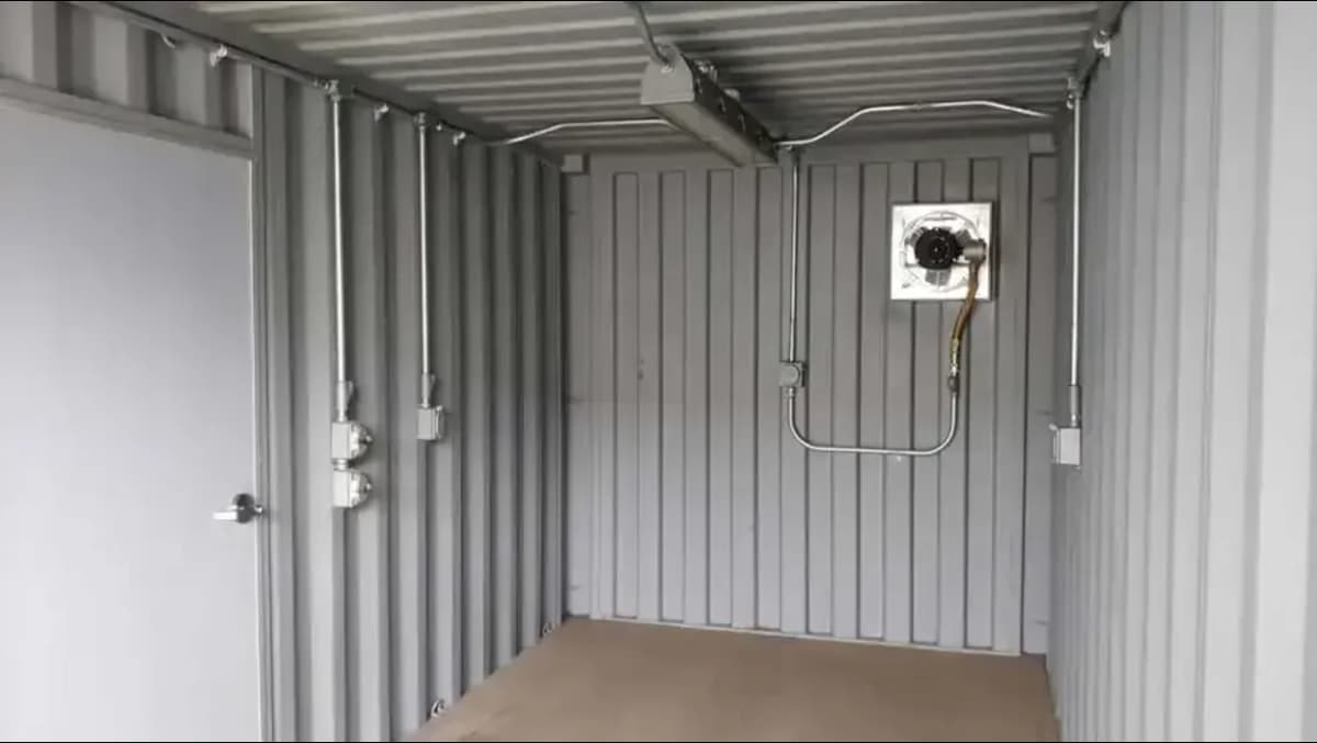 Electrical package installed inside a modified shipping container
