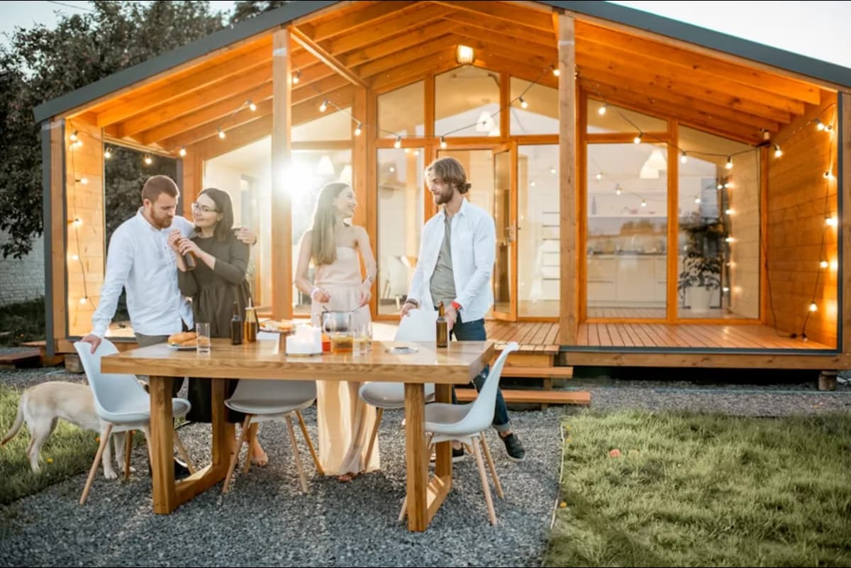 A family at the front of their container home.