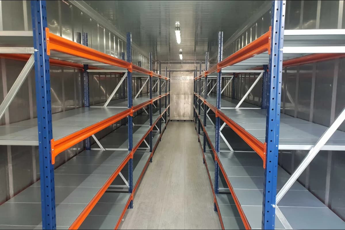 A shipping container with well constructed shelves.