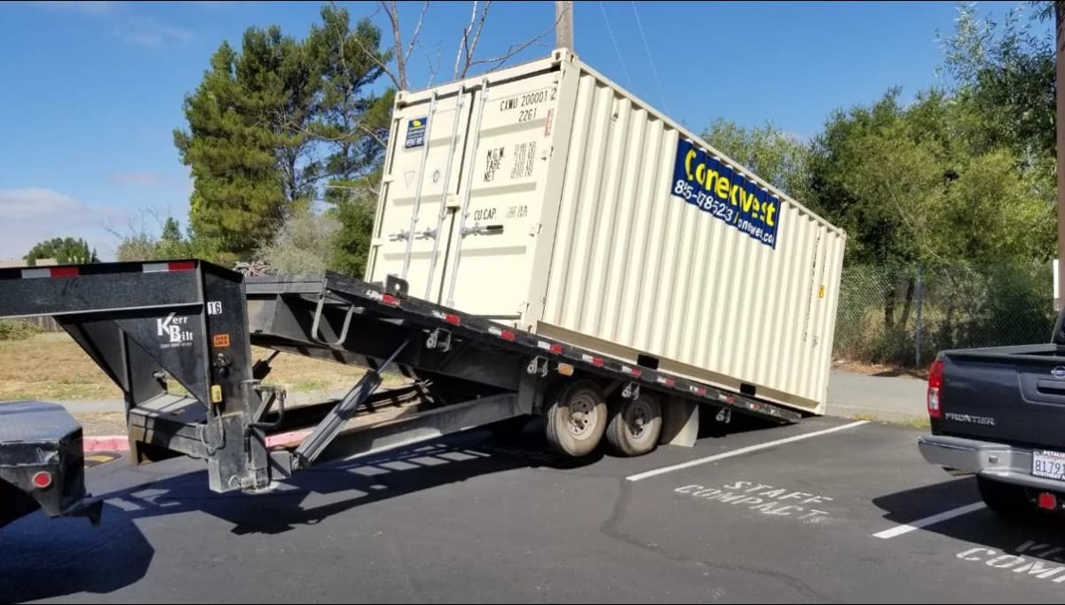 Conexwest delivering a container.