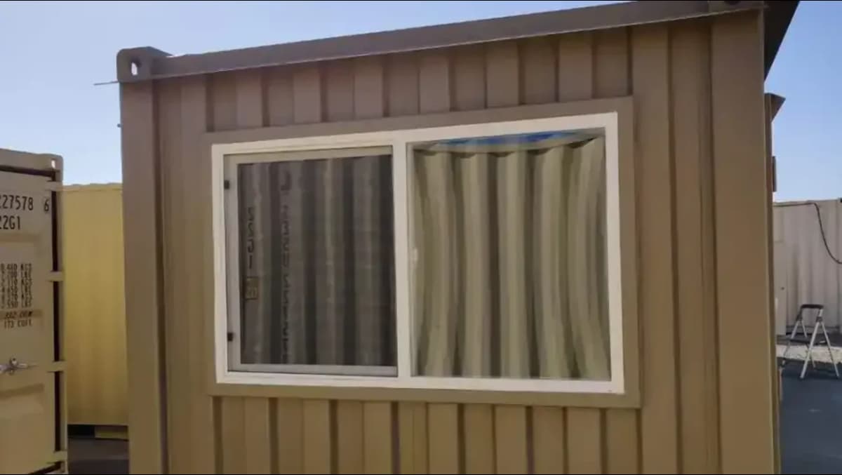 Conexwest double-pane sliding window for shipping containers.