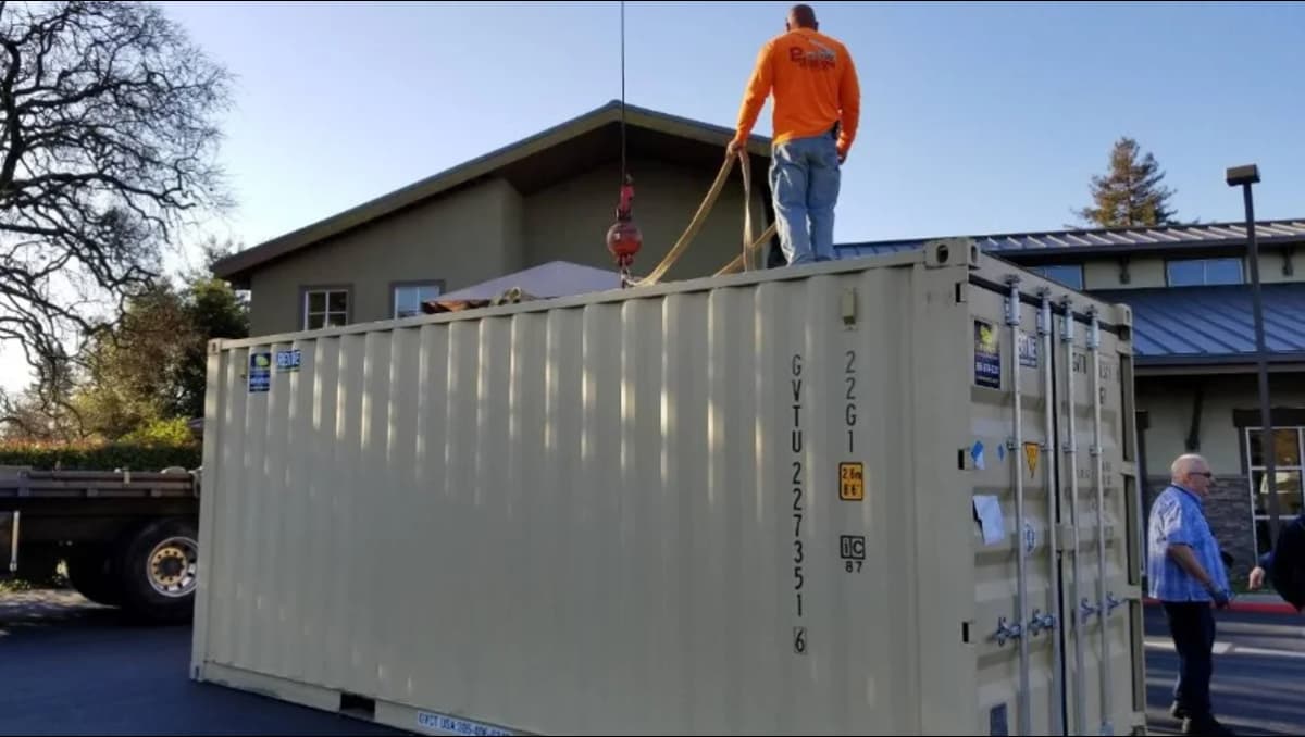 Conexwest team moving a container.