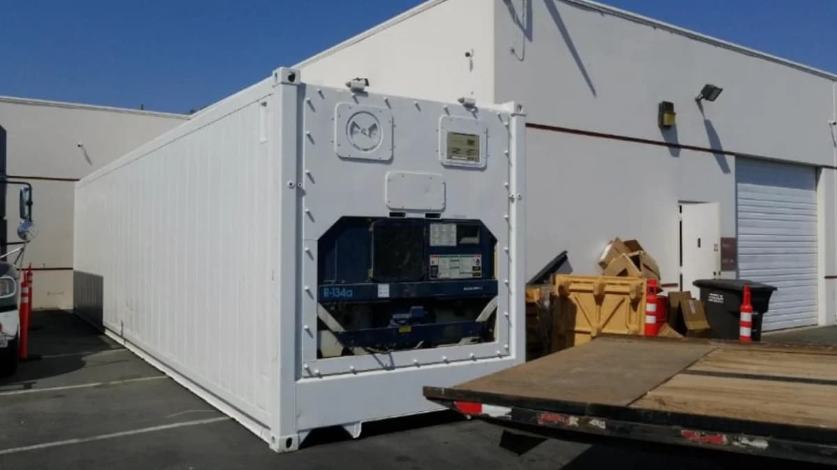 Exterior of a white 40-ft dual voltage refrigerated shipping container.