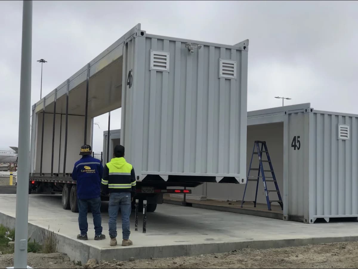 Conexwest team inspecting a container delivery