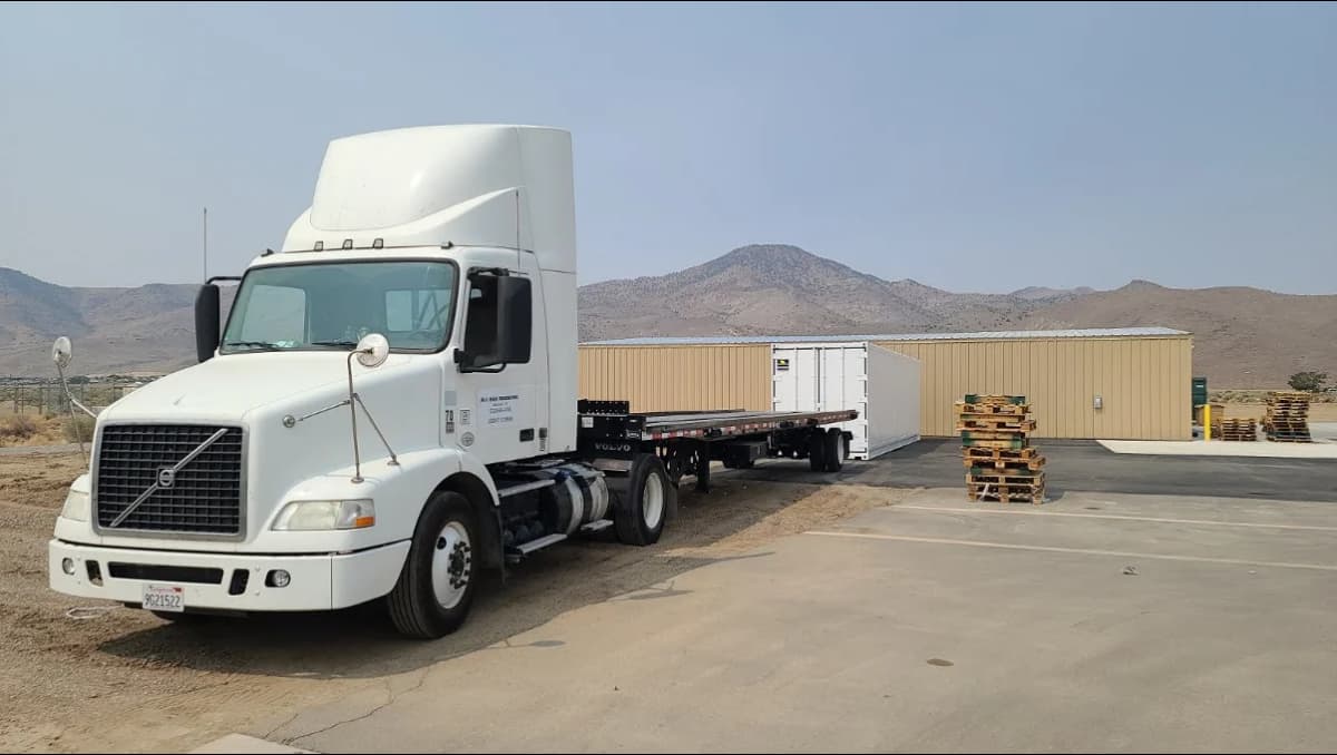 Shipping container delivery by Conexwest.