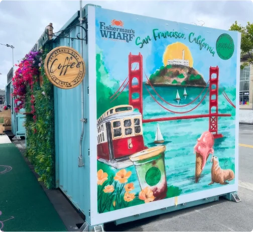 Container mural with cable car and Golden Gate Bridge artwork