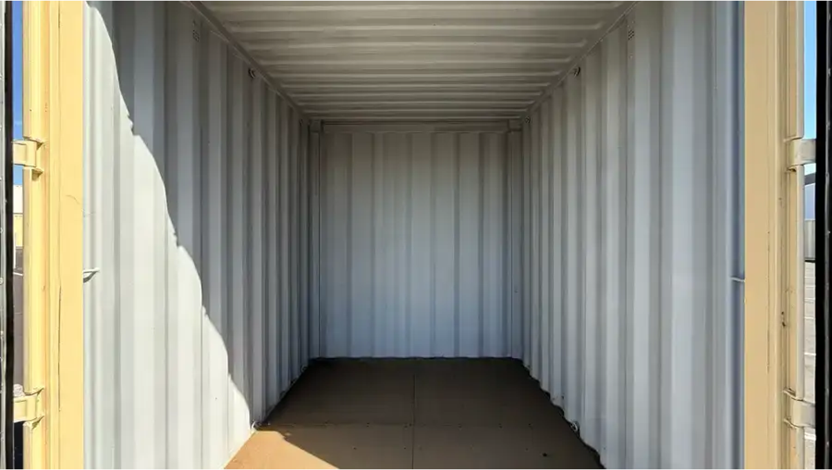 The interior of an empty shipping container