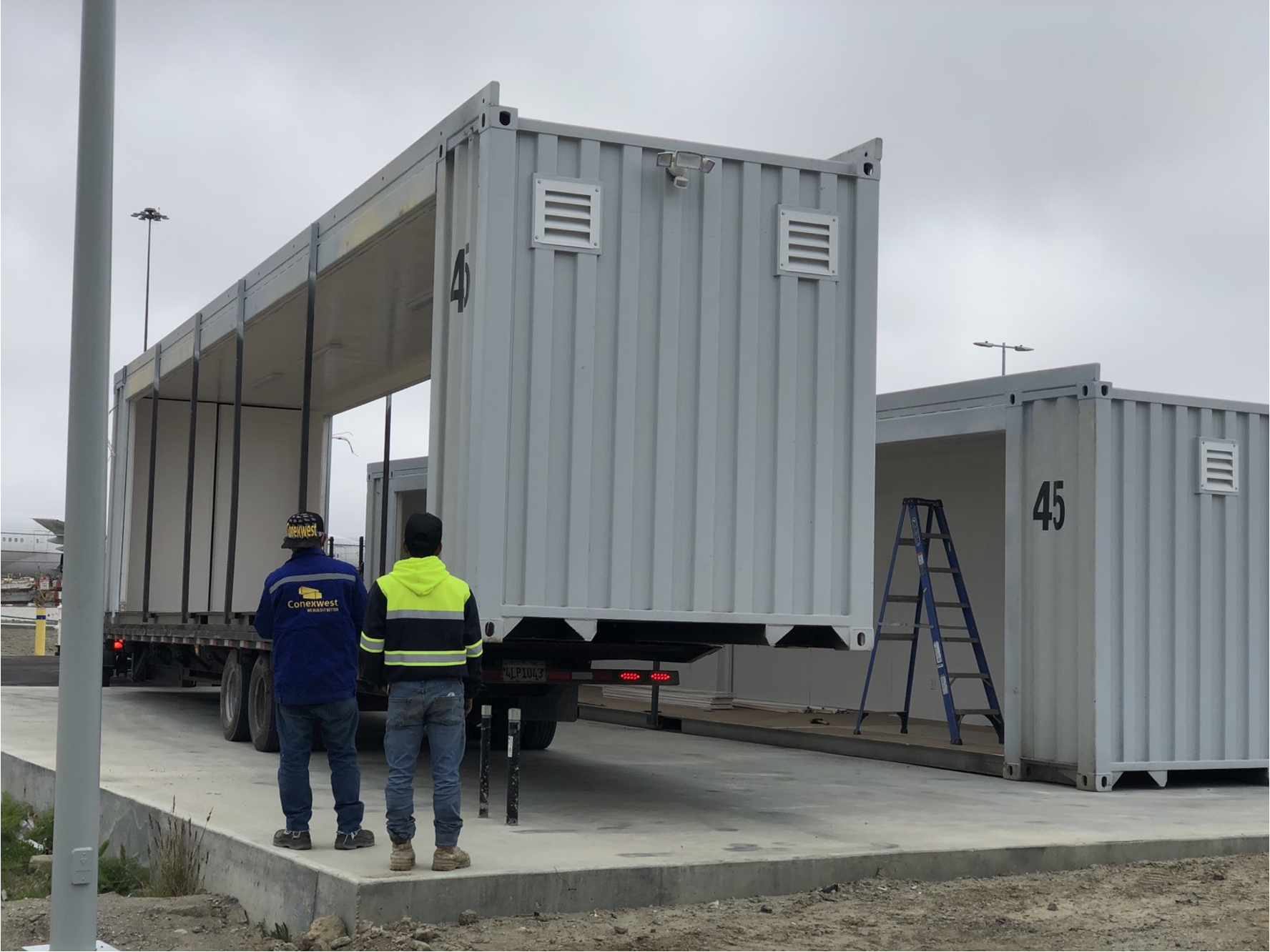 Connecting shipping containers