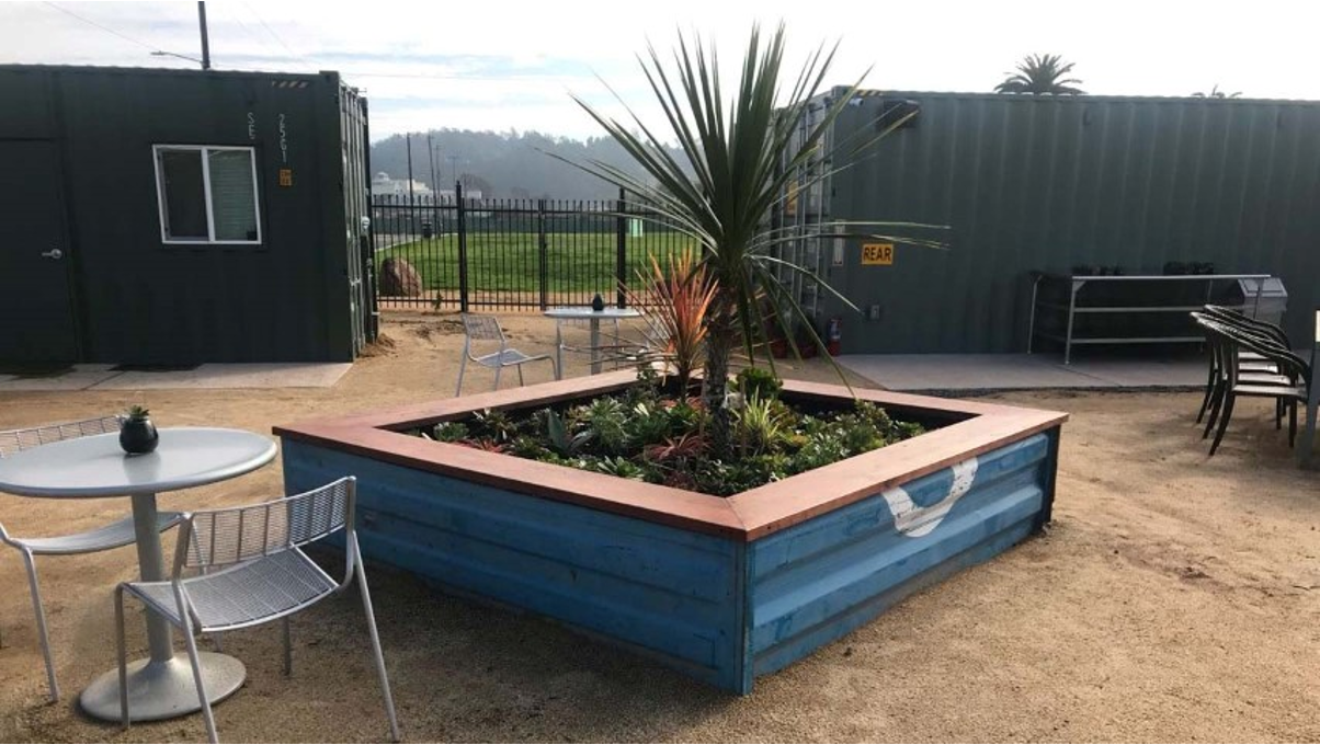 A shipping container outdoor structure. 