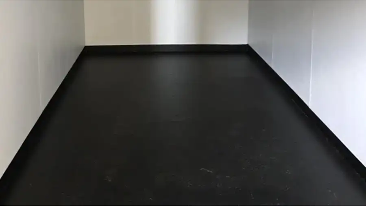 A shipping container with steel flooring