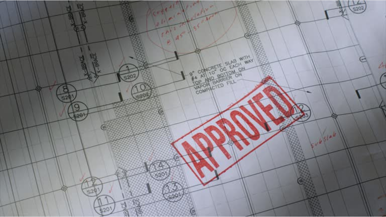 Architectural blueprint with red "APPROVED" stamp overlay.