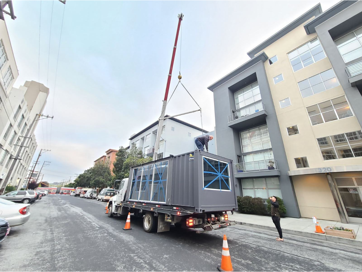 Conexwest delivering a container. 