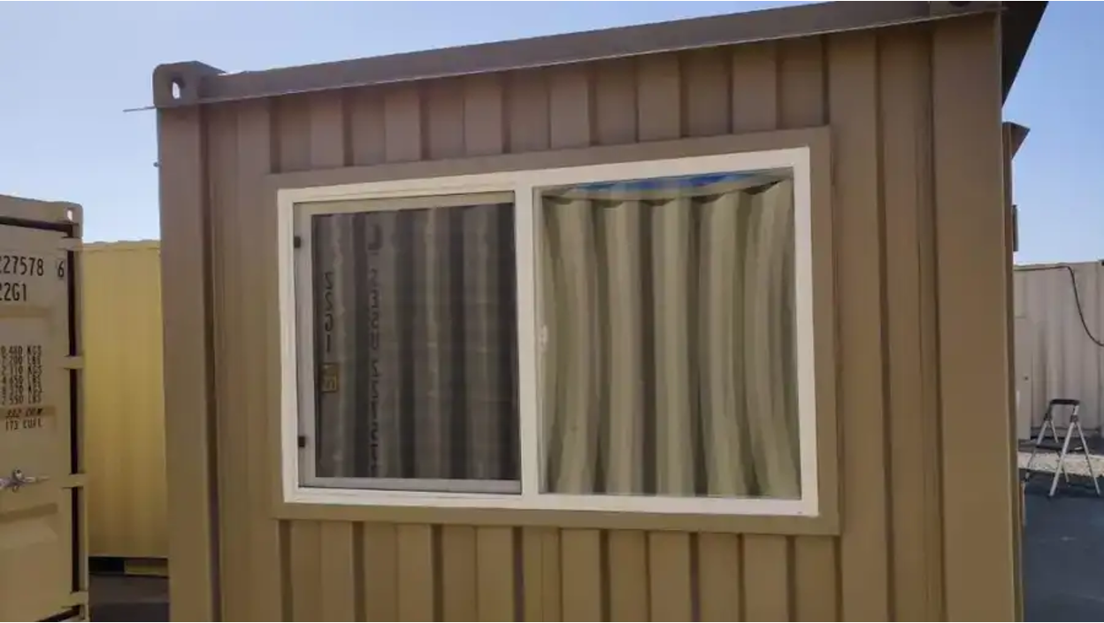 Conexwest double-pane sliding window for shipping containers.