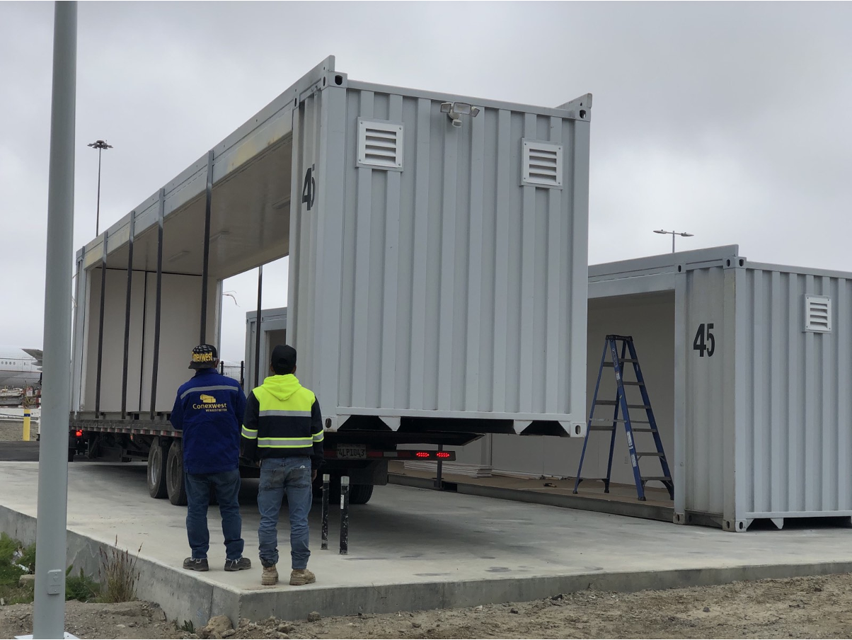 Conexwest team inspecting a container delivery. 