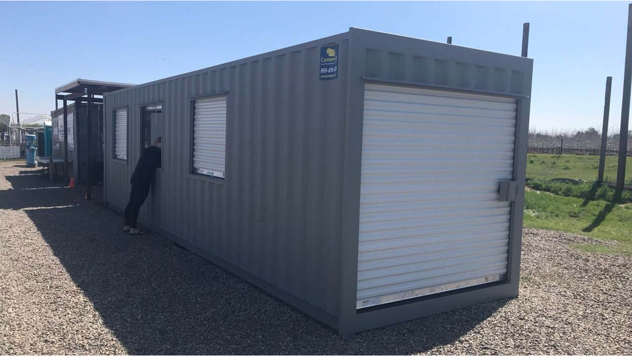 Container with a roll-up door.
