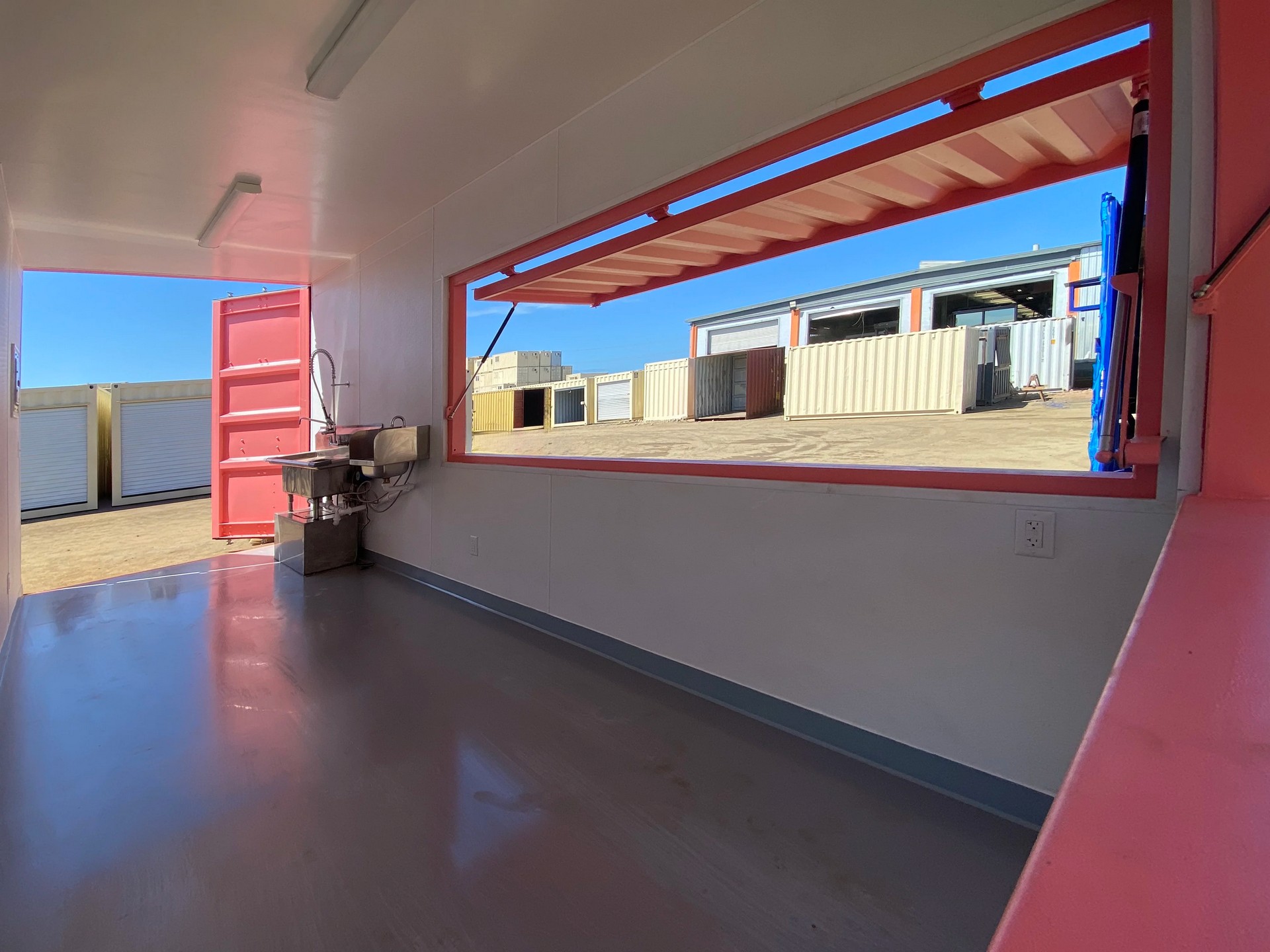 20ft container storefront interior with non-slip flooring and clean white panels