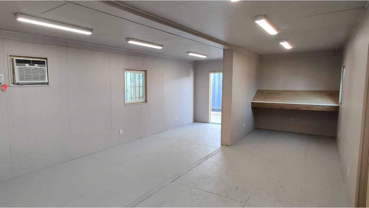 Interior finishes of a shipping container with lighting 
