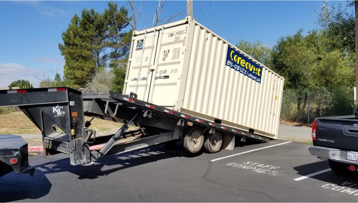 Shipping container delivery by Conexwest. 