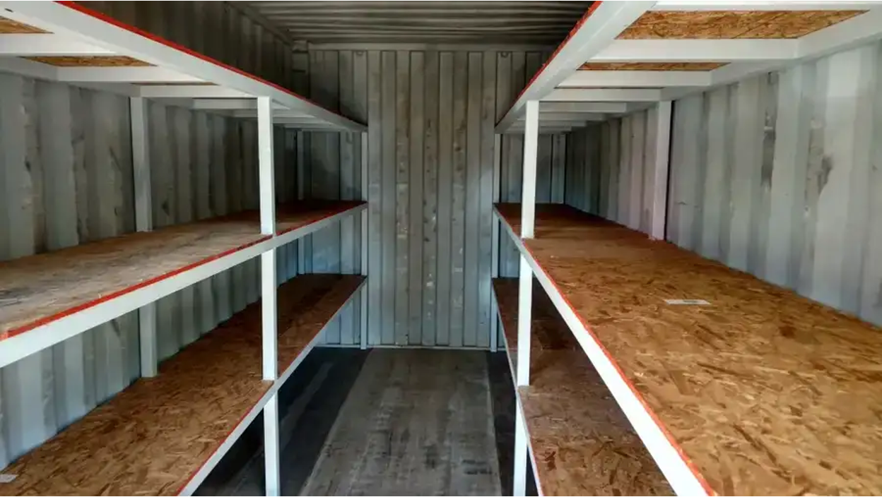 Steel shelving for shipping containers. 