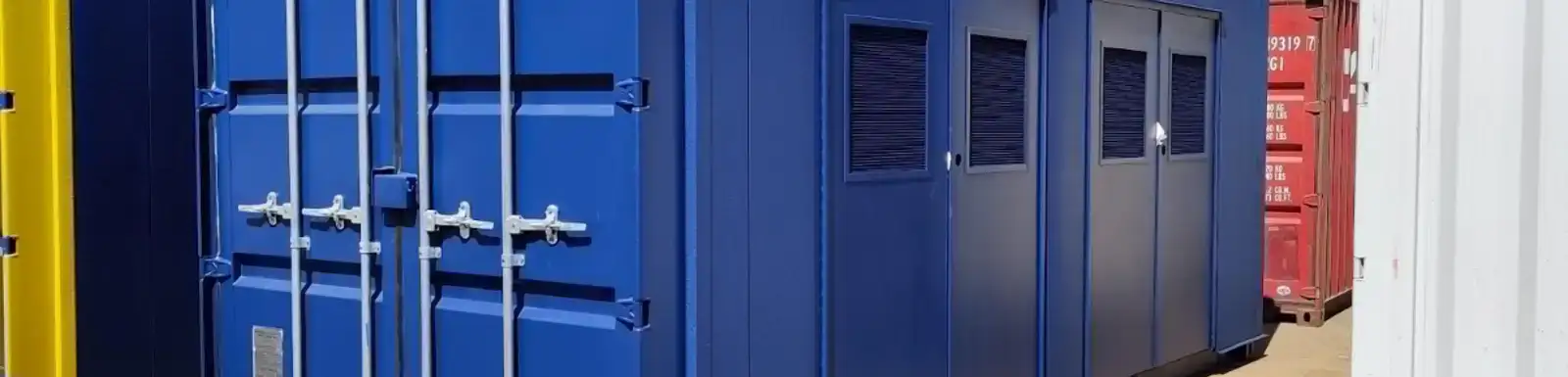 an image of a blue modified shipping container 
