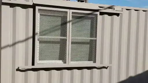 Barn door window security for storage container for sale