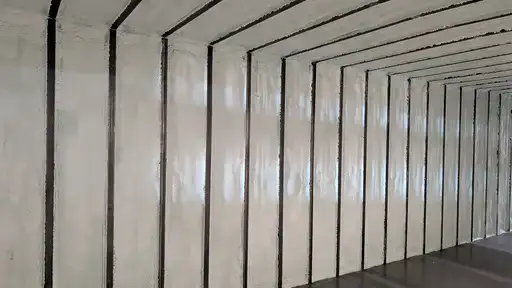 Spray foam insulation of shipping container